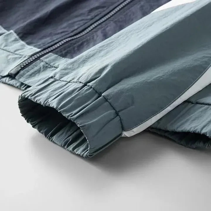 Veste coupe-vent à capuche pour homme