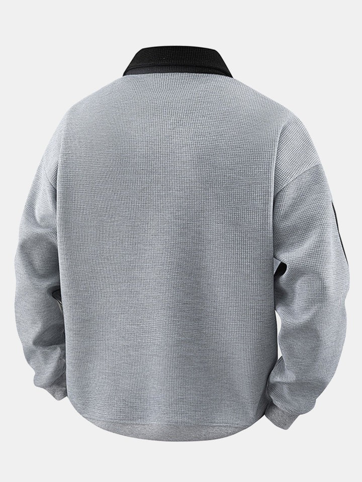 Sweat à col zippé avec bandes contrastées